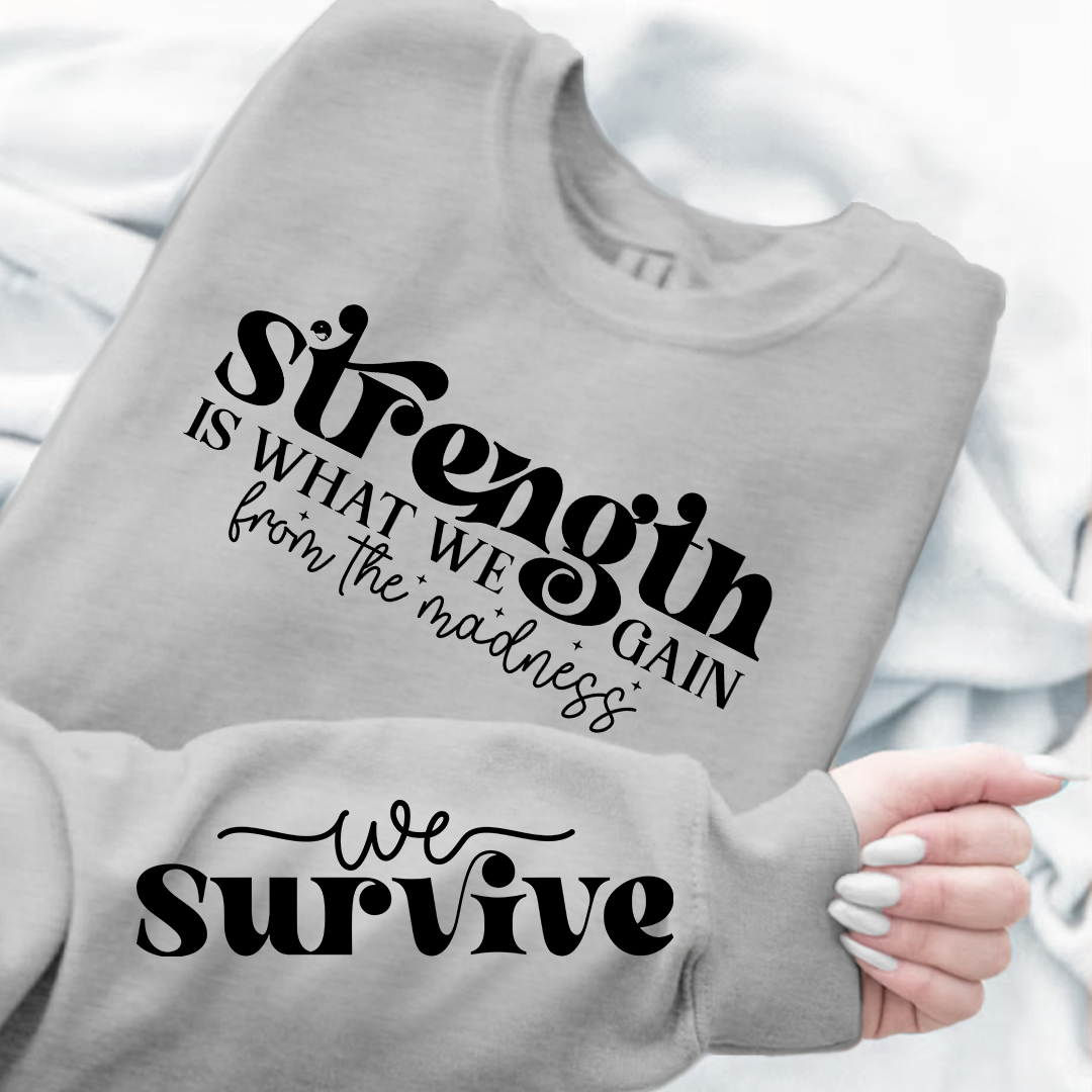 Sweatshirt Unisex Strength Is What We Gain From The Madness