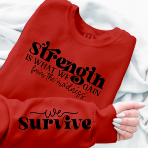 Sweatshirt Unisex Strength Is What We Gain From The Madness