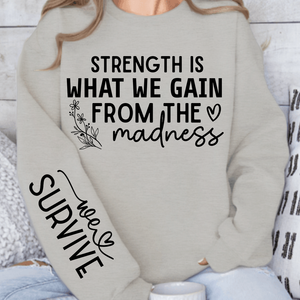 Sweatshirt Unisex Strength Is What We Gain From The Madness