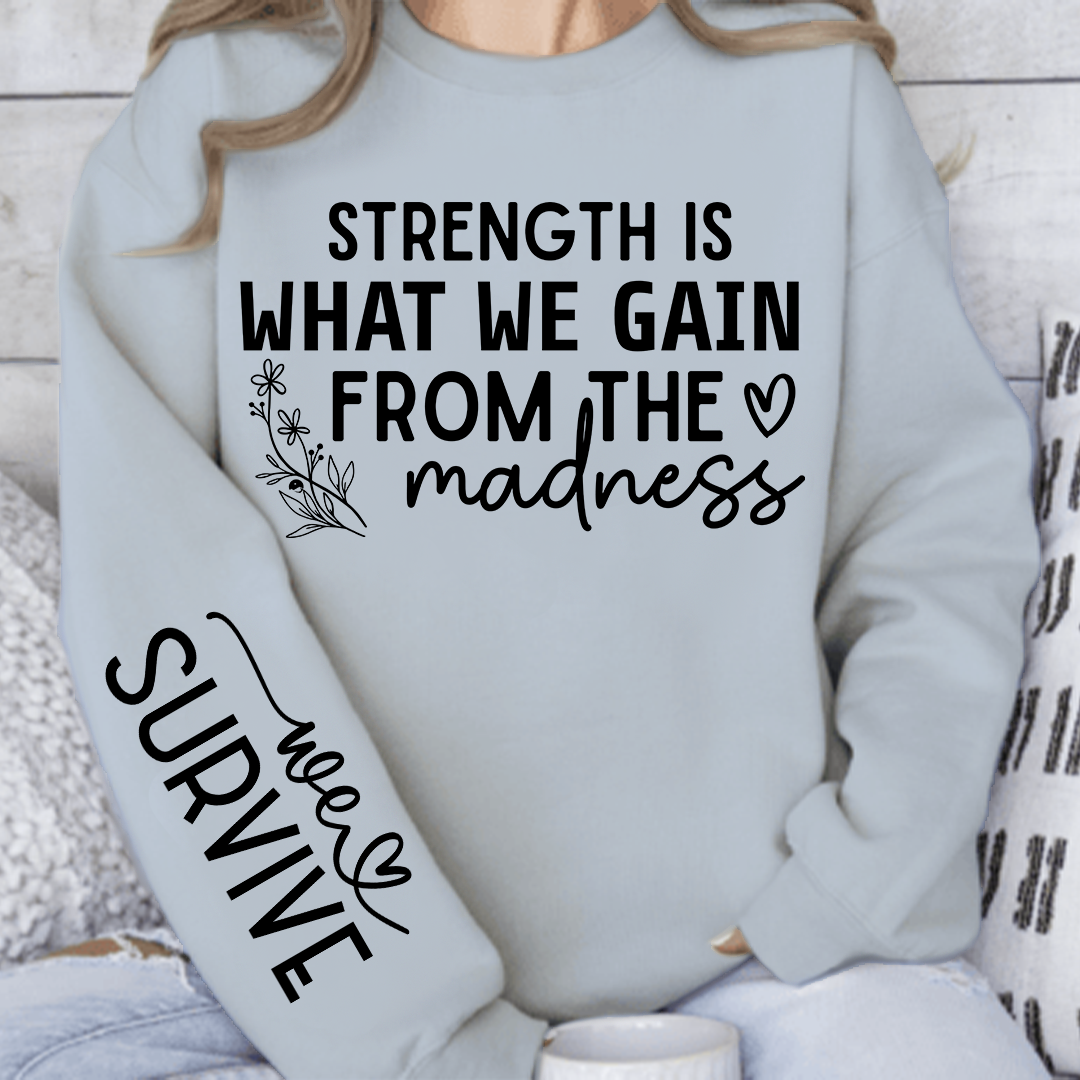 Sweatshirt Unisex Strength Is What We Gain From The Madness