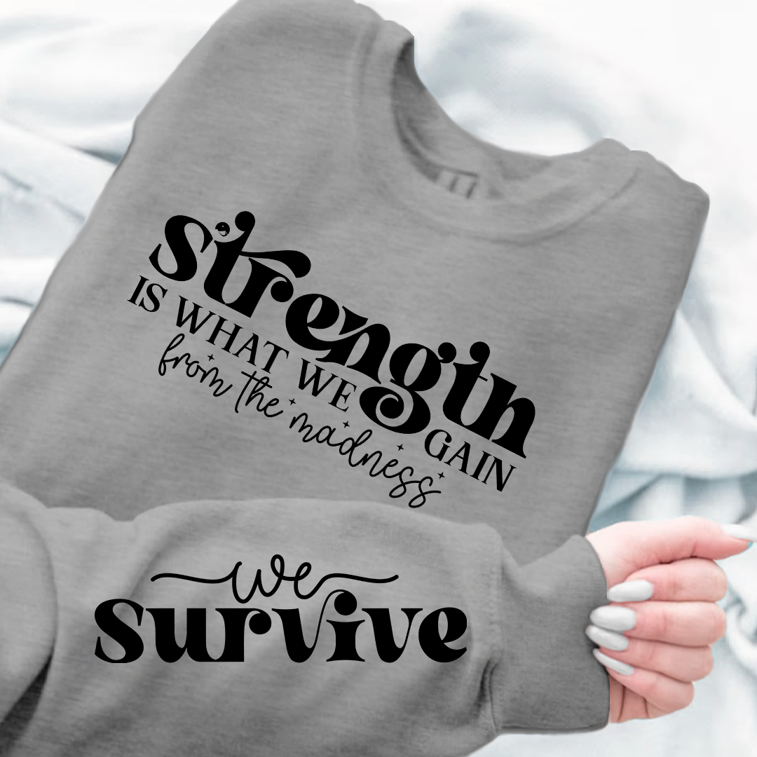 Sweatshirt Unisex Strength Is What We Gain From The Madness