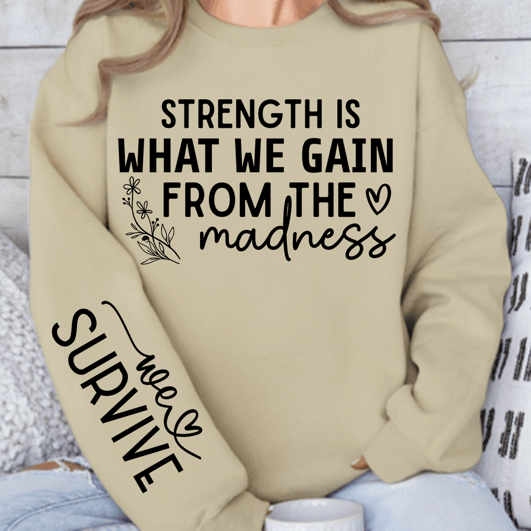 Sweatshirt Unisex Strength Is What We Gain From The Madness