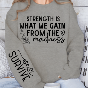 Sweatshirt Unisex Strength Is What We Gain From The Madness
